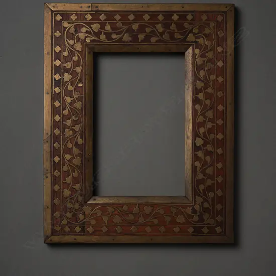 Indian Wood and brass frame,